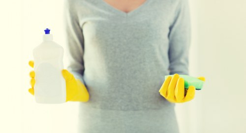 Professional carpet cleaning process in progress with extraction equipment