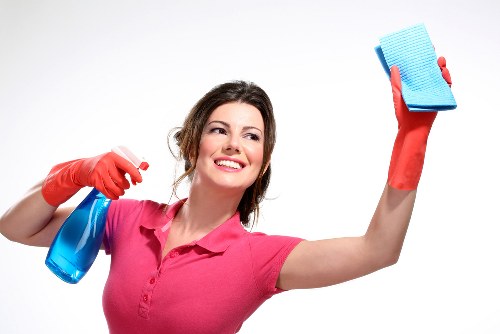Local upholstery cleaner treating a sofa in Twickenham