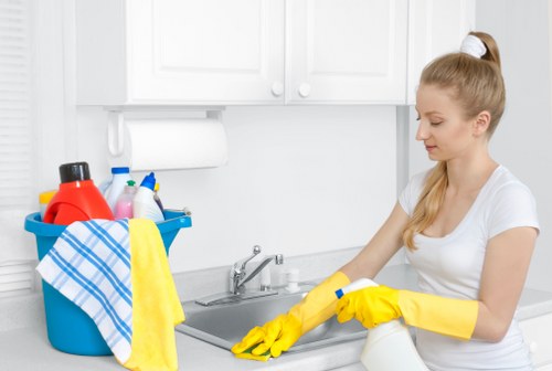 Move-out cleaning team working in a Twickenham home with period features